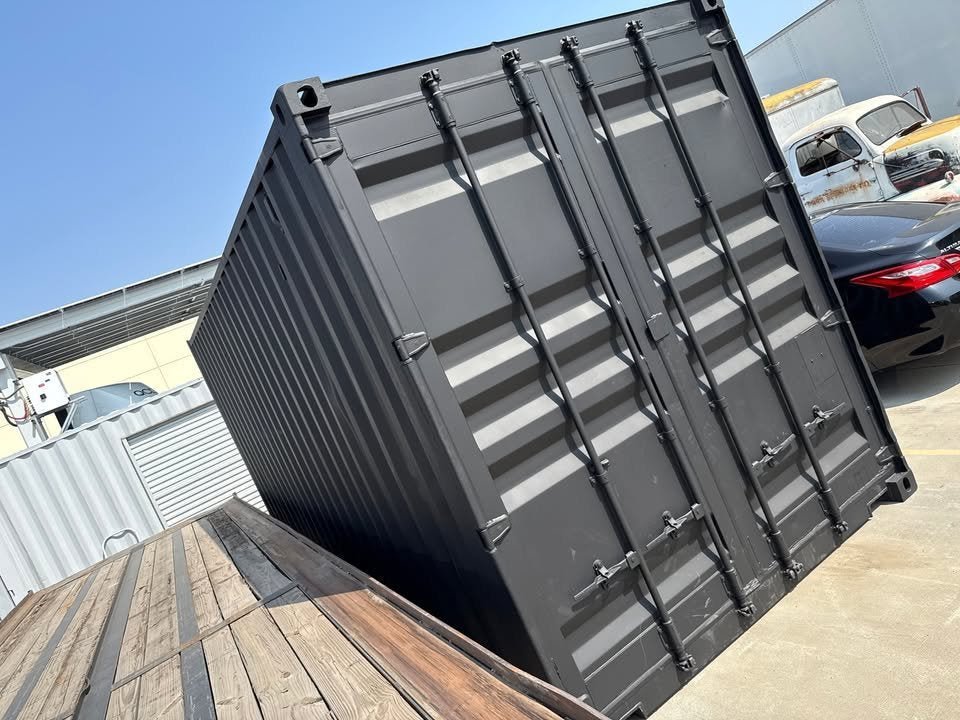 20ft Used Shipping Container โ Matte Black w/ 12โ Side Roll-Up Door